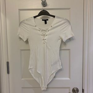 White ribbed bodysuit.